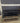 02118 Black Glass Top Media Console Table