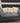 44363 Vintage Blue Upholstered Loveseat with Beige Cushions